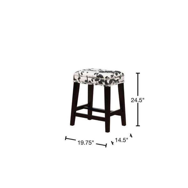 black and white cow print bar stools