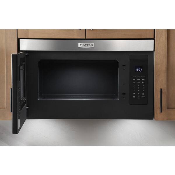 https://images.thdstatic.com/productImages/8469b9ee-24dd-4728-8d49-c5921586e685/svn/black-maytag-over-the-range-microwaves-mmmf6030pb-31_600.jpg