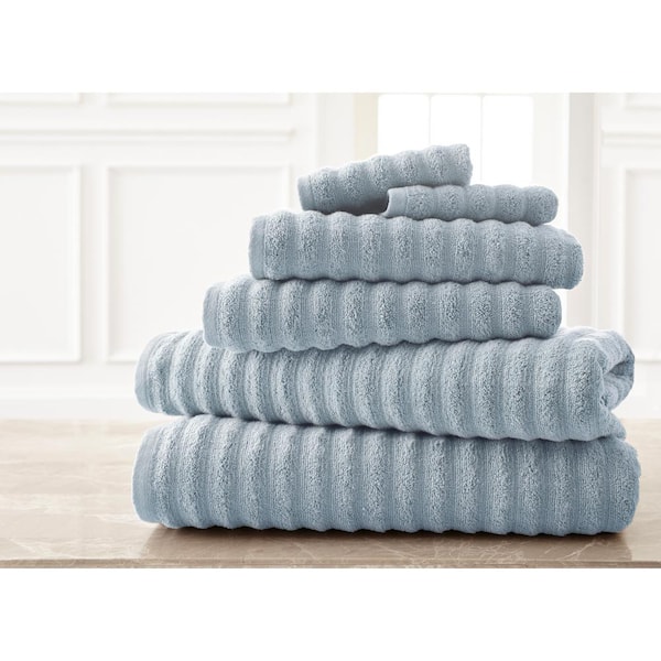 https://images.thdstatic.com/productImages/84770908-5aa8-4ea8-b693-3f270b680f17/svn/blue-modern-threads-bath-towels-5wvyspag-blu-st-64_600.jpg