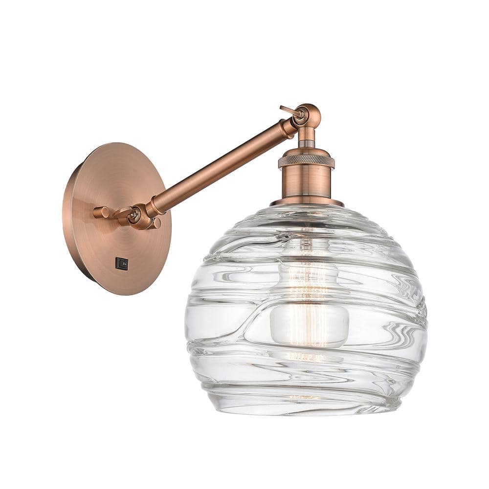 Athens Deco Swirl 1-Light Antique Copper, Clear Deco Swirl Wall Sconce with Clear Glass Shade price history on PriceWatchPro
