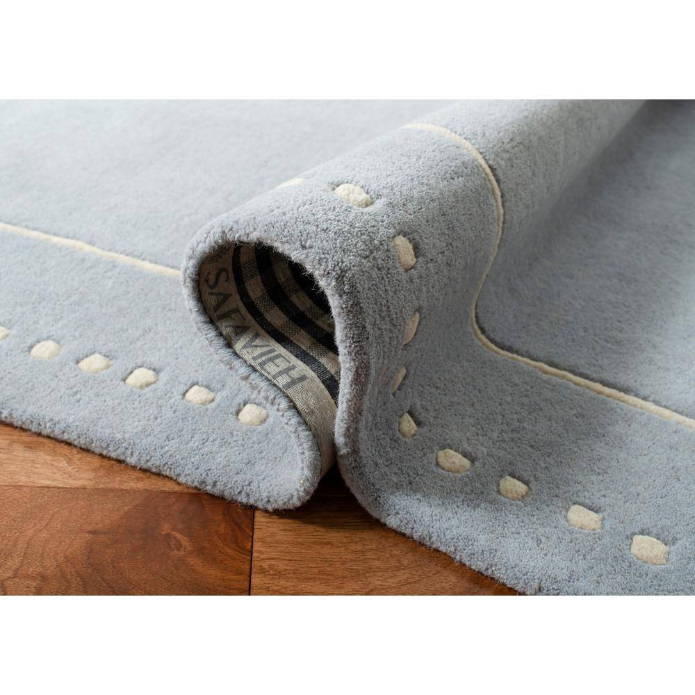 Hand-Tufted Ivory and Light Blue Wool Accent Rug 2' x 3'
