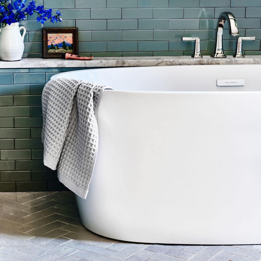 White Acrylic Freestanding Oval Bathtub with Chrome Overflow