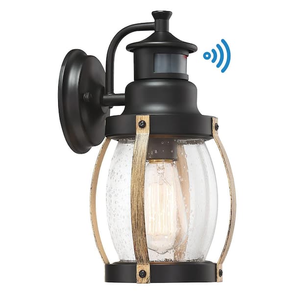 C Cattleya 1-Light Black and Woodgrain Motion Sensing Dusk to Dawn Outdoor Hardwired Wall Lantern Scone with Bulb Included