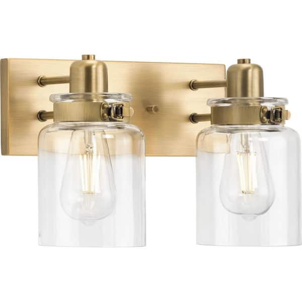 Calhoun Collection 13-1/4 in.2-Light Gold Vintage Brass Clear Glass Farmhouse Urban Industrial Bathroom Vanity Light