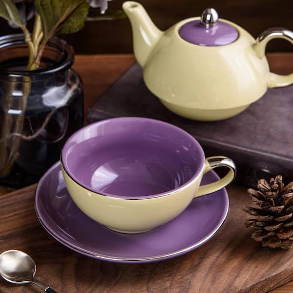 https://images.thdstatic.com/productImages/84ac71b2-4c71-471b-a514-c958e528b7c1/svn/yellow-and-purple-artvigor-tea-kettles-art-cc010-c3_600.jpg
