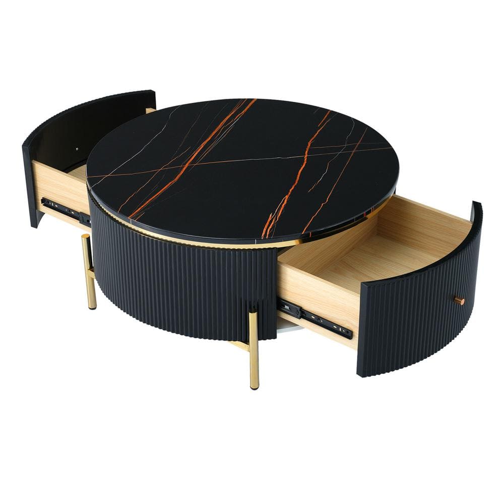 Round black marble coffee table with two drawers pulled out.