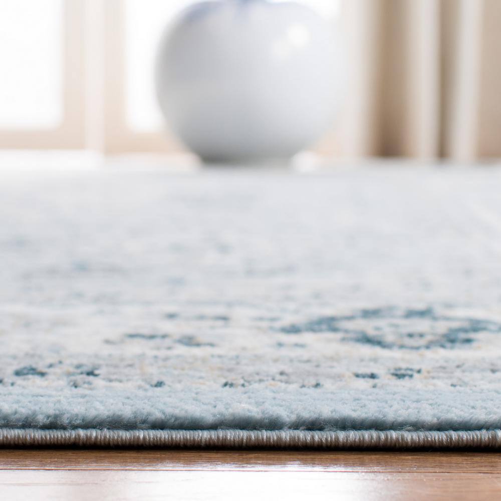 Isabella Blue and Cream Round Synthetic Area Rug