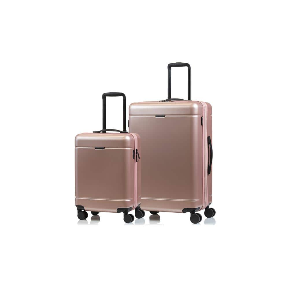 champs rose gold luggage