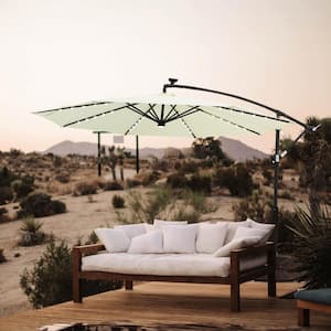 10 ft. Steel Cantilever Solar Lighted Patio Umbrella with Cross Base Stand in Ivory Solution Dyed Polyester