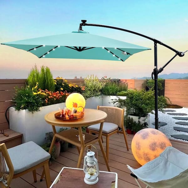Unbranded 10 ft. Steel Market Solar LED Lighted Tilt Patio Umbrella in Turquoise with Crank and Cross Base