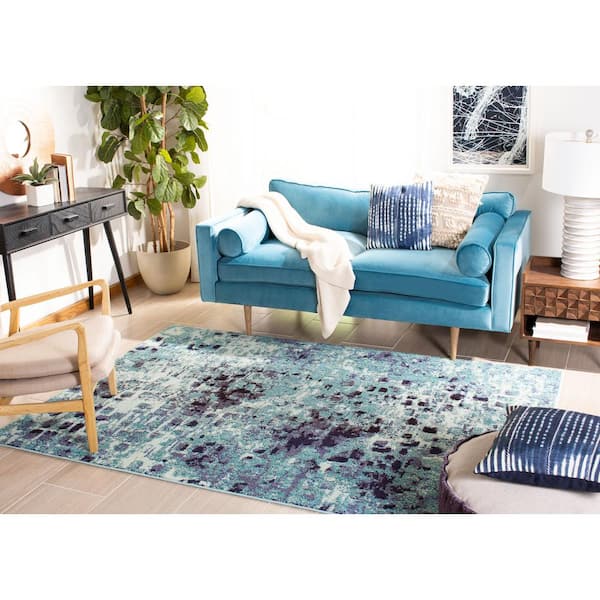 https://images.thdstatic.com/productImages/8502ac4a-9cc4-468a-a5c0-6042e420c4a3/svn/turquoise-navy-safavieh-area-rugs-mad425j-5-31_600.jpg