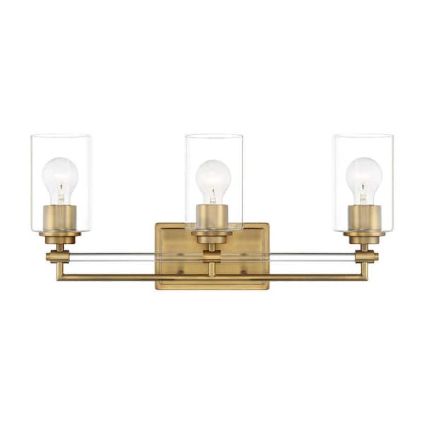 Minka Lavery Binsly 24 in. 3-Light Aged Brass Vanity Light with Clear Glass Shades