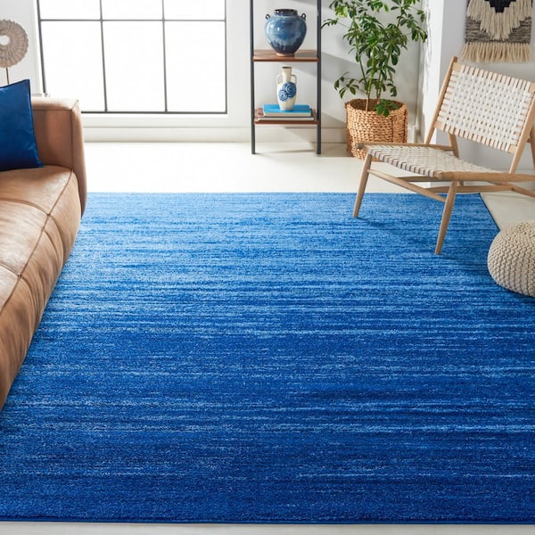 https://images.thdstatic.com/productImages/8504e0a1-6fff-4eba-a355-35adede55a2f/svn/light-blue-dark-blue-safavieh-area-rugs-adr113f-1115-e1_600.jpg