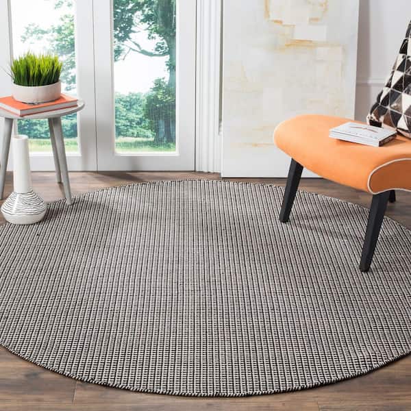 Montauk Ivory/Black 6 ft. x 6 ft. Round Solid Area Rug