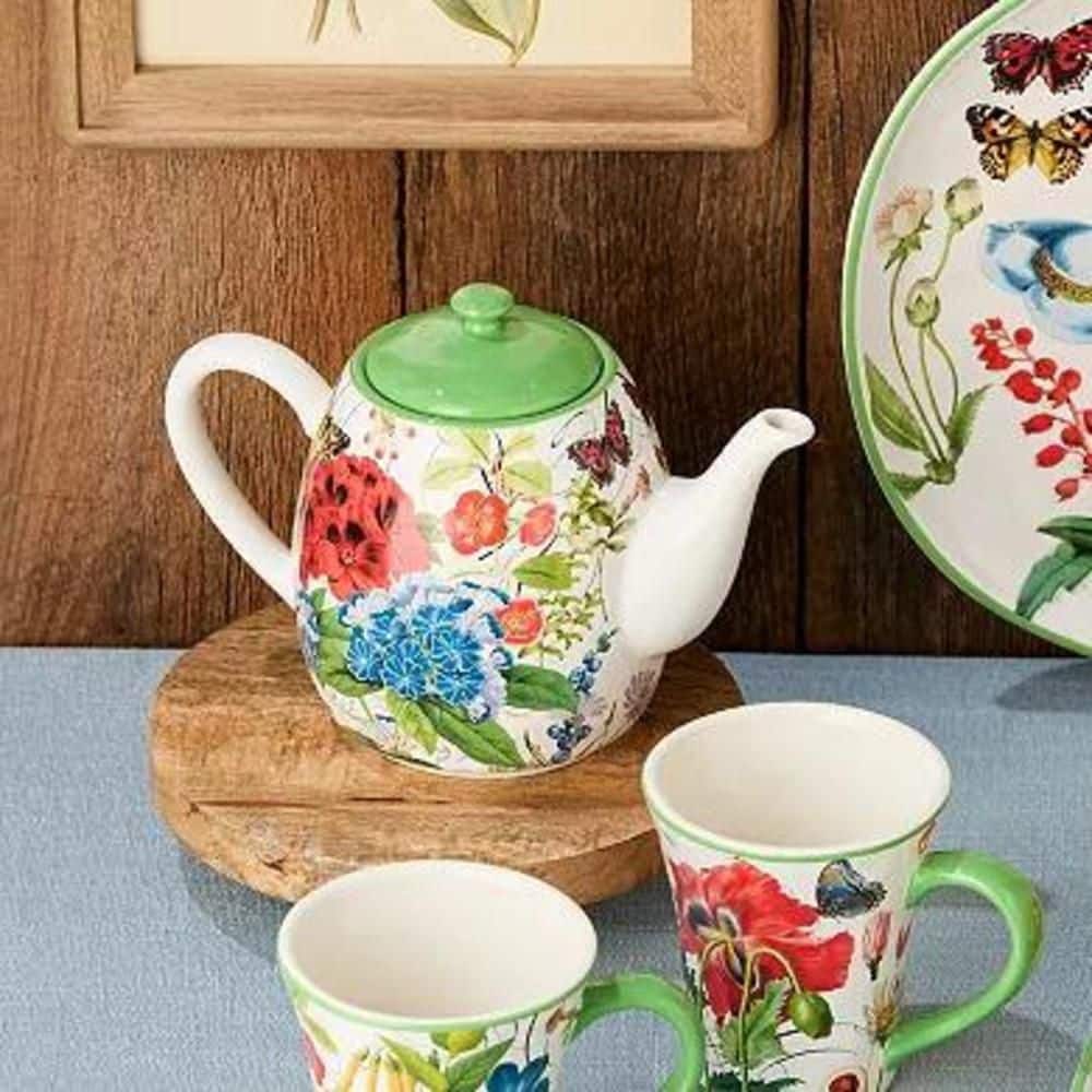 Green and White Ceramic Floral Teapot with Butterfly Accents