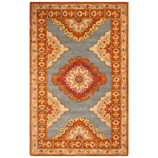 Heritage Blue/Rust 6 ft. x 9 ft. Border Area Rug