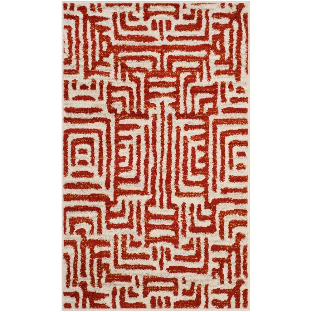 Ivory and Terracotta Geometric Synthetic Area Rug