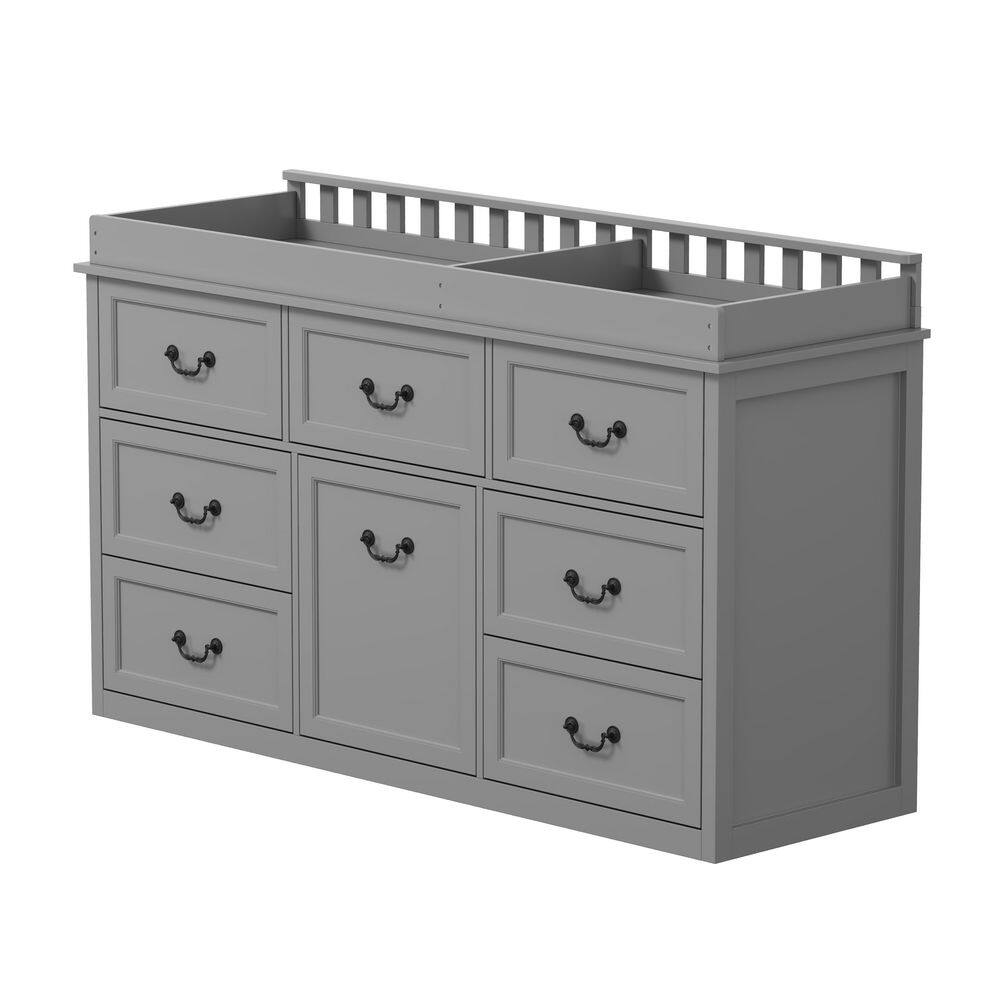 Gray pine wood dresser with changing table top and eight drawers.