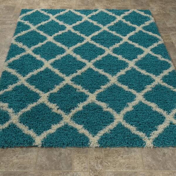 https://images.thdstatic.com/productImages/854af8d8-9b59-4d9a-b583-21f123873d1f/svn/turquoise-ottomanson-area-rugs-shg2276-3x5-1d_600.jpg