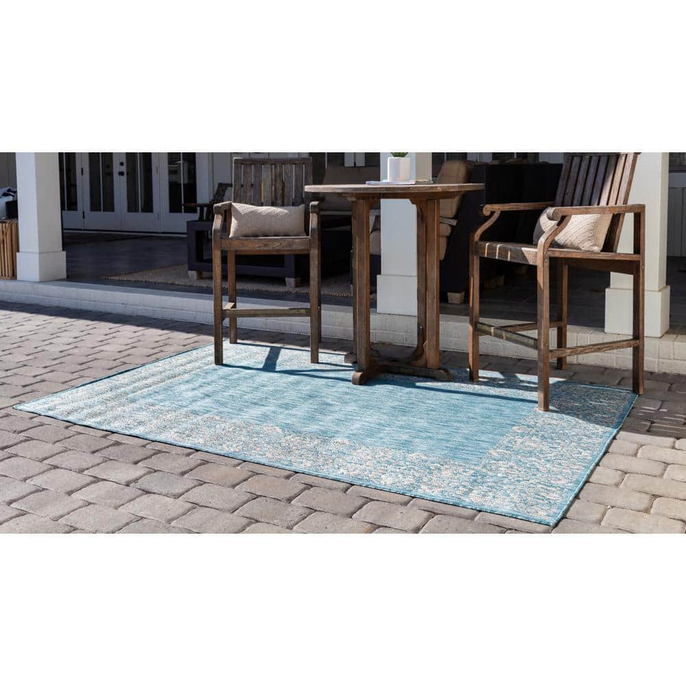 Aqua Floral Bliss Easy-Care Synthetic Outdoor Rug 7'1" x 10'
