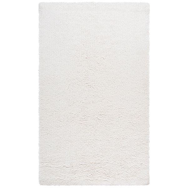 Casablanca 9 ft. x 12 ft. Ivory Solid Area Rug