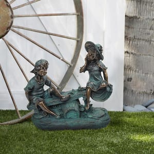 14 in. Tall Indoor/Outdoor Girl and Boy Playing on Teeter Totter Statue Yard Art Decoration