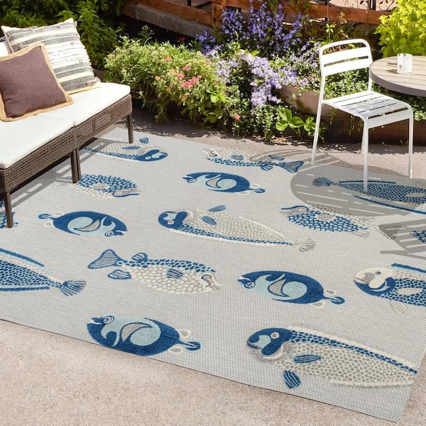 https://images.thdstatic.com/productImages/855b25df-248c-4d60-8d92-1e12ca9621e6/svn/gray-navy-jonathan-y-outdoor-rugs-amc114b-8-64_600.jpg