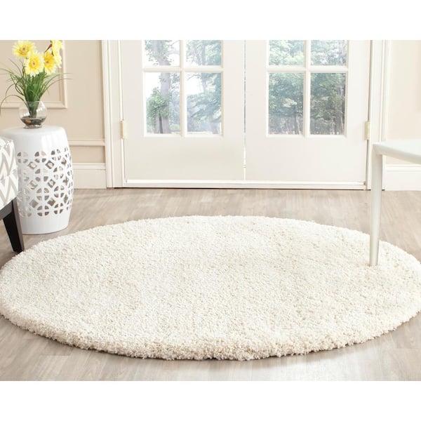 Milan Shag 7 ft. x 7 ft. Ivory Round Solid Area Rug