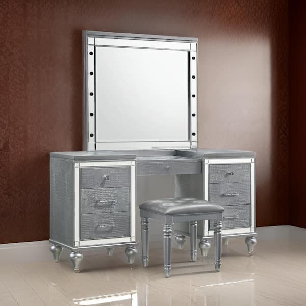 Benjara Lee 1 Piece Gray Makeup Vanity Table with Embossed Inlay and 7 Mirror Accented Drawers BM316473