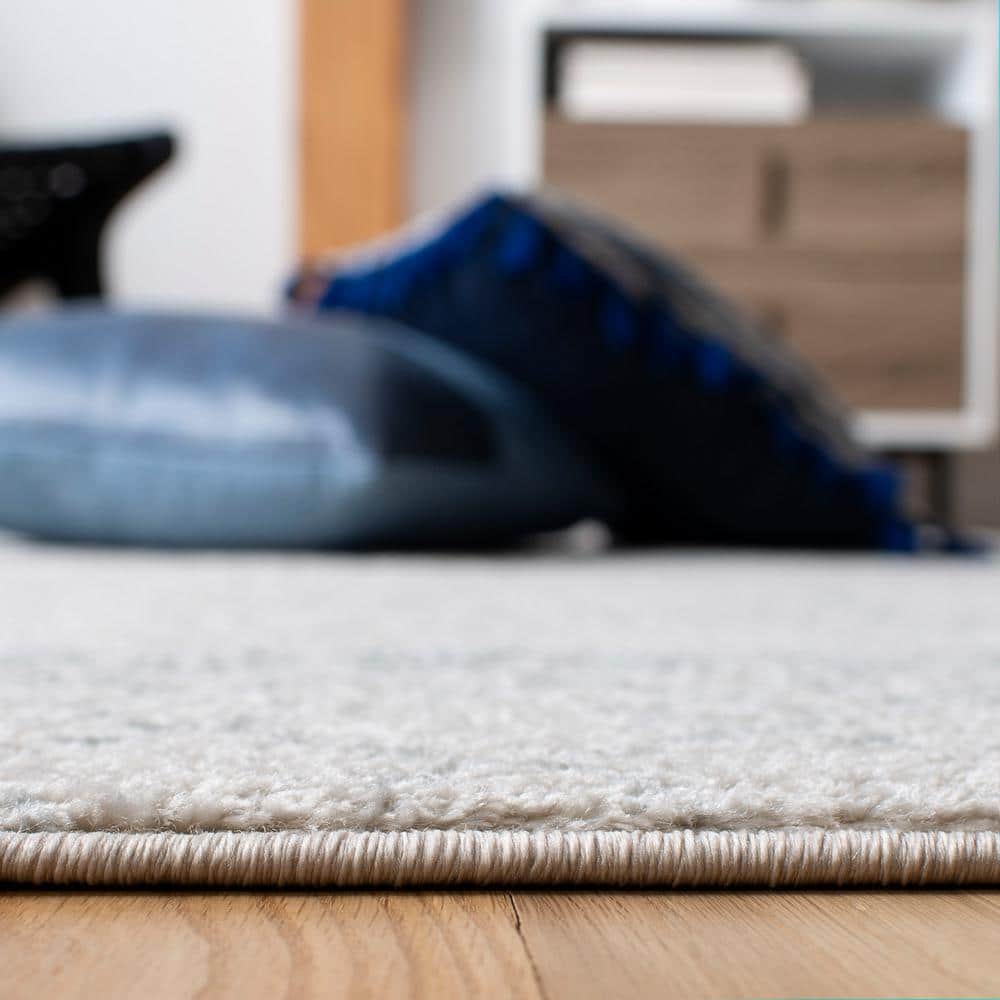 Ivory & Light Grey Reversible Synthetic Area Rug, 9' x 12'