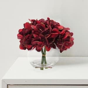 7 in. Burgundy Artificial Hydrangea Flower Arrangement in Round Glass Vase