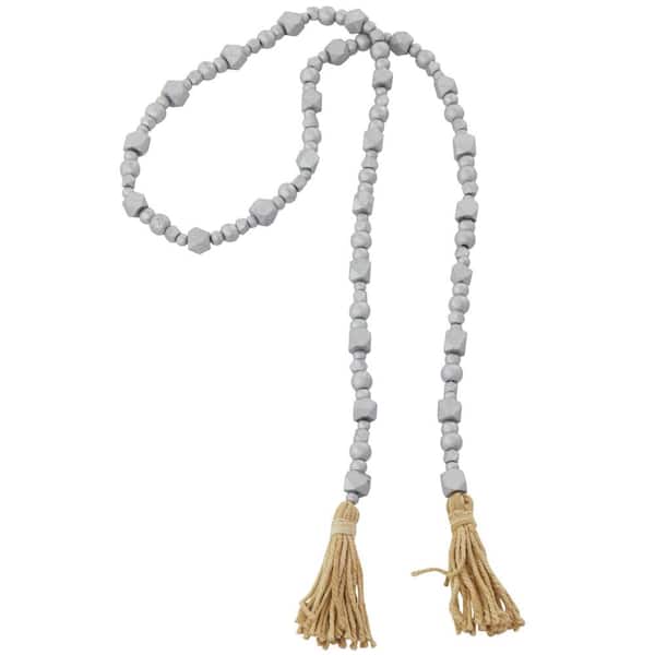 Litton Lane Silver Handmade Mango Wood Hexagon Metallic Carved Geometric Long Beaded Garland with Tassel