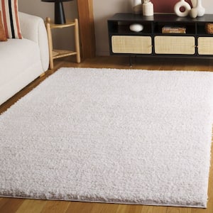 Rumi Shag 6 ft. x 9 ft. Ivory/Light Beige Solid Color Area Rug
