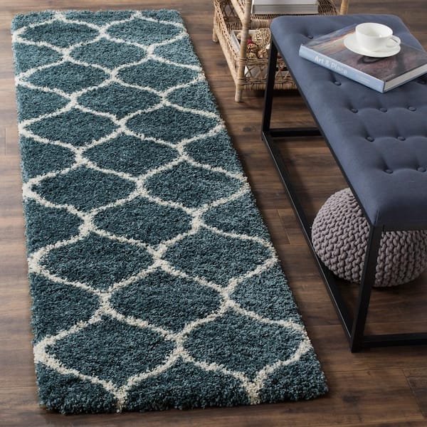 https://images.thdstatic.com/productImages/8631bc6e-e9d9-4a78-a5ae-ee0f546b3d80/svn/slate-blue-ivory-safavieh-area-rugs-sgh280l-28-e1_600.jpg