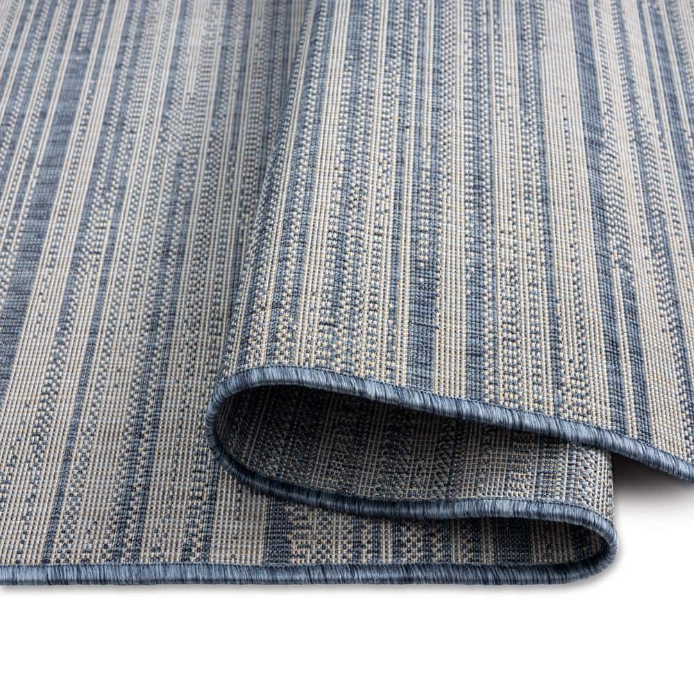 Abstract Blue and Beige Indoor/Outdoor Synthetic Area Rug, 5'2"x7'2"
