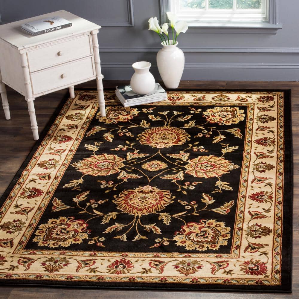 Black and Ivory Floral Synthetic 5' x 7' Area Rug