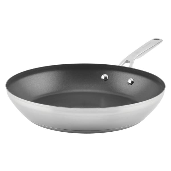https://images.thdstatic.com/productImages/86496965-3952-4015-b47a-f1735fdc6284/svn/stainless-steel-kitchenaid-skillets-71010-64_600.jpg