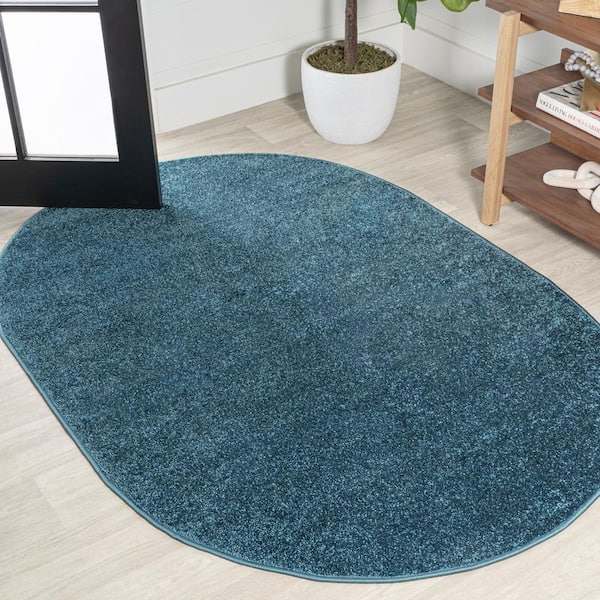JONATHAN Y Haze Solid Low-Pile Turquoise 5 ft. x 8 ft. Oval Area Rug