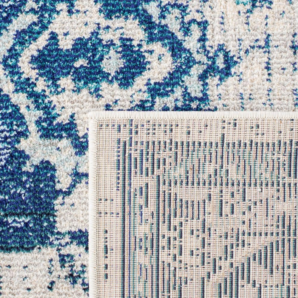 Ivory and Blue Distressed Boho Chic 8' x 10' Area Rug