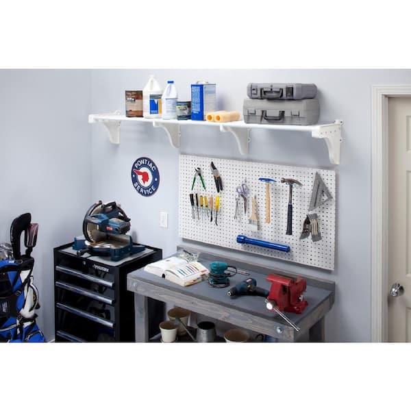 https://images.thdstatic.com/productImages/8675fd39-53a2-4a3a-8bbd-a1d0326c0839/svn/white-ez-shelf-garage-wall-shelving-ezs-g-sw72-64_600.jpg