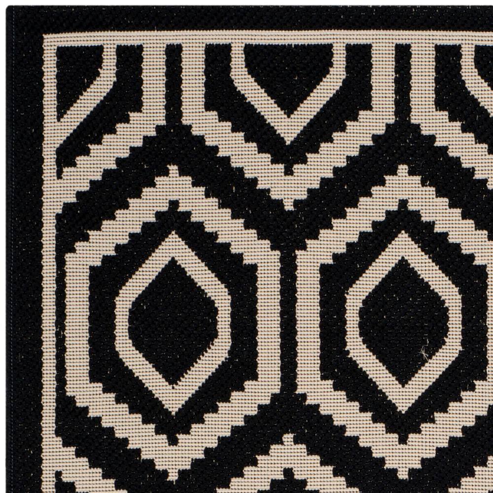 Rectangular Black and Beige 5' x 7' Wool Blend Area Rug