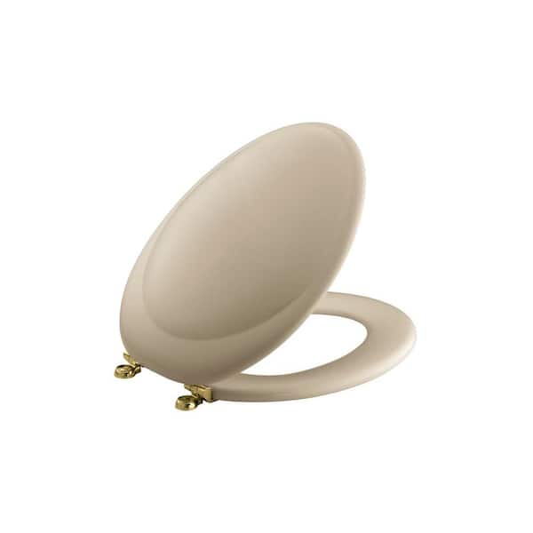 KOHLER Revival Elongated Closed-Front Toilet Seat with Polished Brass hinges