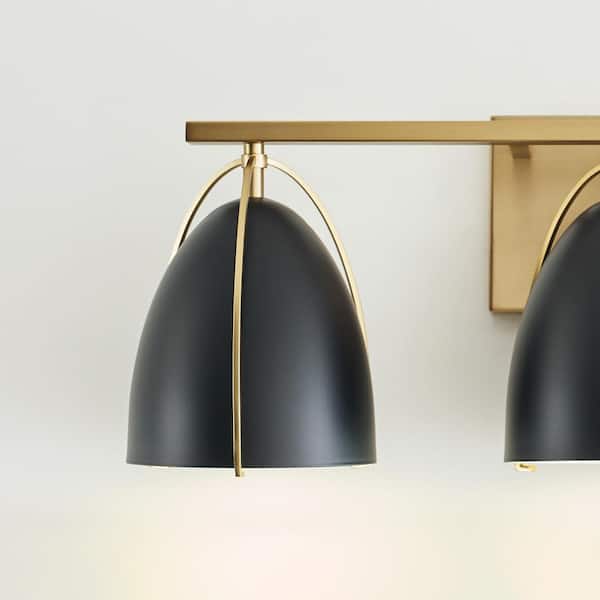 Generation Lighting - Norman 24.25 in. H 3-Light Satin Brass Vanity Light with Midnight Black Steel Shades