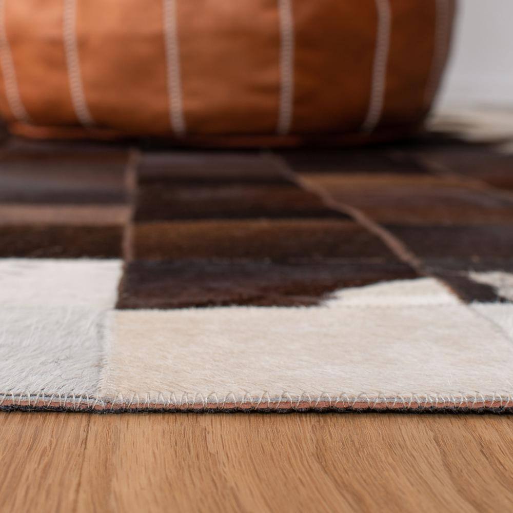 Artisan Ivory Geometric Hand-Stitched Cowhide 5' x 8' Area Rug