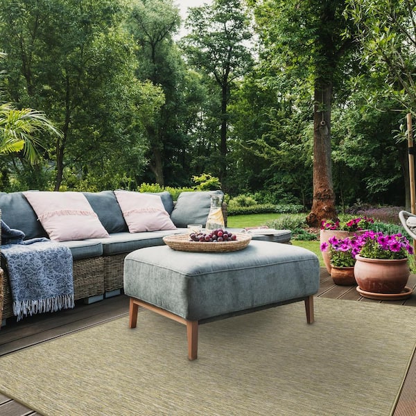 https://images.thdstatic.com/productImages/86cf3d16-608f-4759-90c8-8c022add5474/svn/green-ottomanson-outdoor-rugs-sun2005-5x7-1f_600.jpg