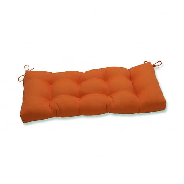 Pillow Perfect Solid Rectangular Outdoor Bench Cushion in Orange
