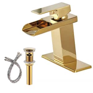 Waterfall Single Hole Single-Handle Low-Arc Bathroom Faucet With Pop-up Drain Assembly in Gold