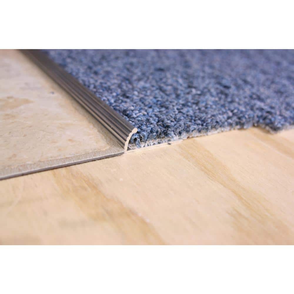 https://images.thdstatic.com/productImages/86ee53f9-a97d-4e90-8a9f-43bb6f295556/svn/shiney-m-d-building-products-carpet-transition-strips-78147-64_1000.jpg