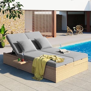 Brown Wicker Outdoor Chaise Lounge Day Bed with Light Gray Cushions and Pillows