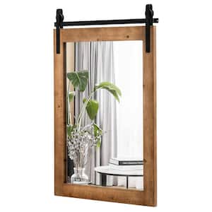 22 in. W x 30 in. H Rectangular Framed Wall Mount Bathroom Vanity Mirror Wood Frame Barn Door Style Brown